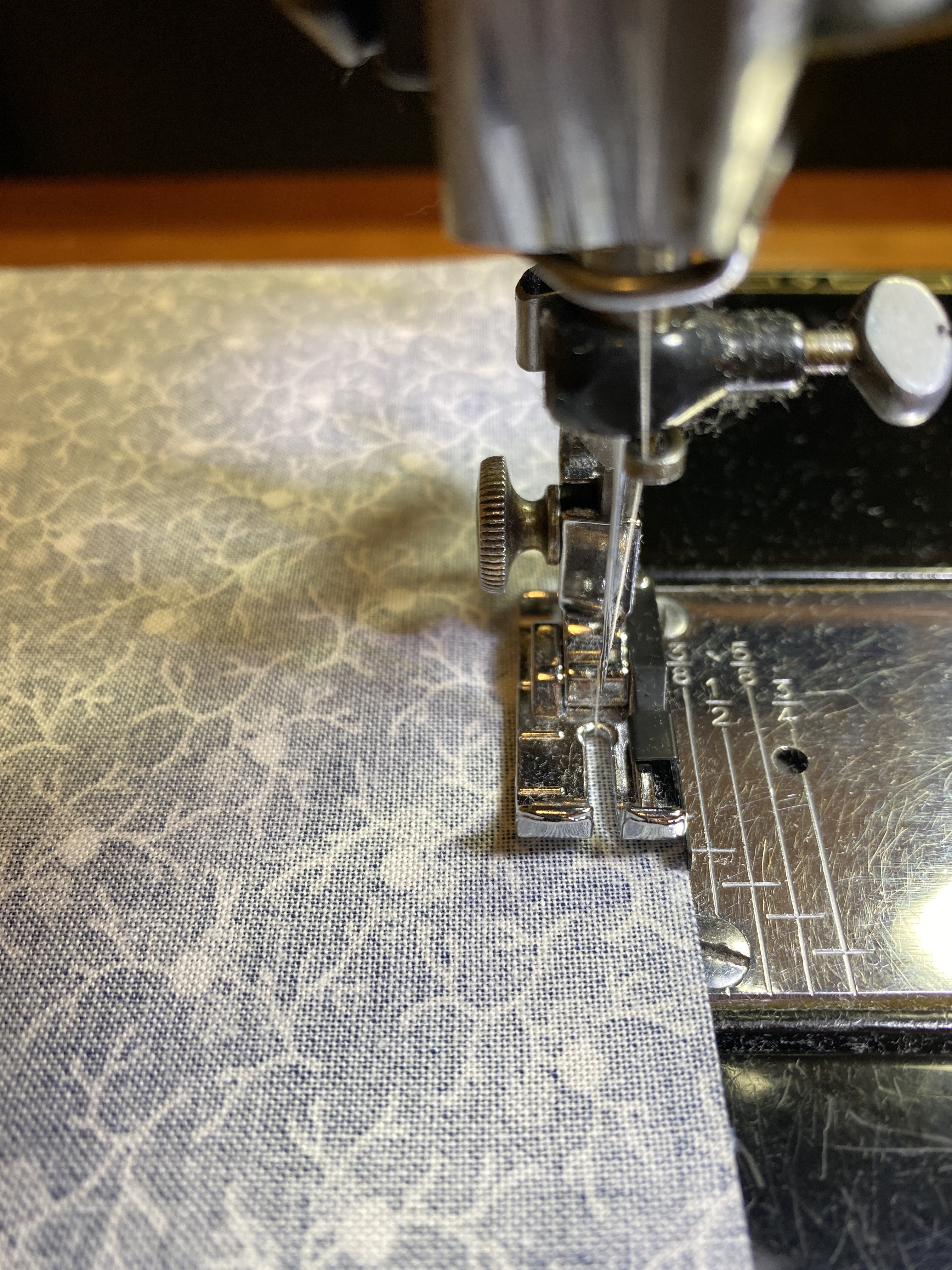 Janome 1/4” foot with guide for center needle machines