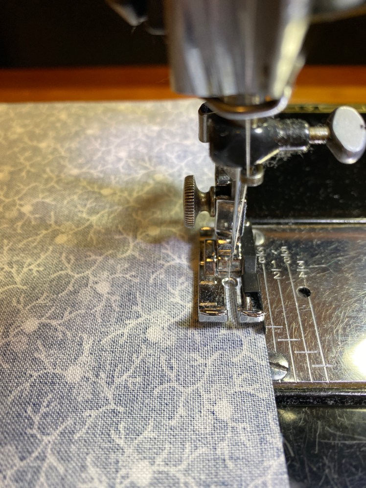 Janome 1/4” foot with guide for center needle machines