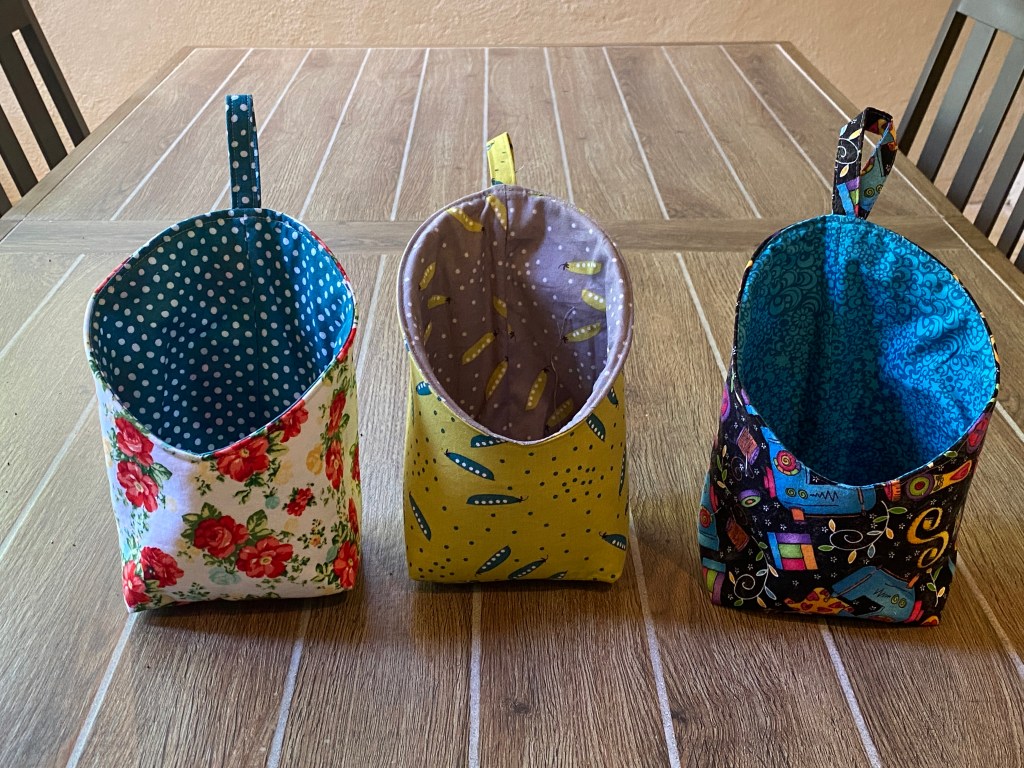 A series of three storage pods made using a free pattern from Fabric Editions. 